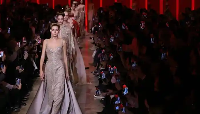 Paris Fashion Week: Jennifer Lopez shimmies, Elie Saab shimmers, and Valentino's Piccioli rediscovers his mojo